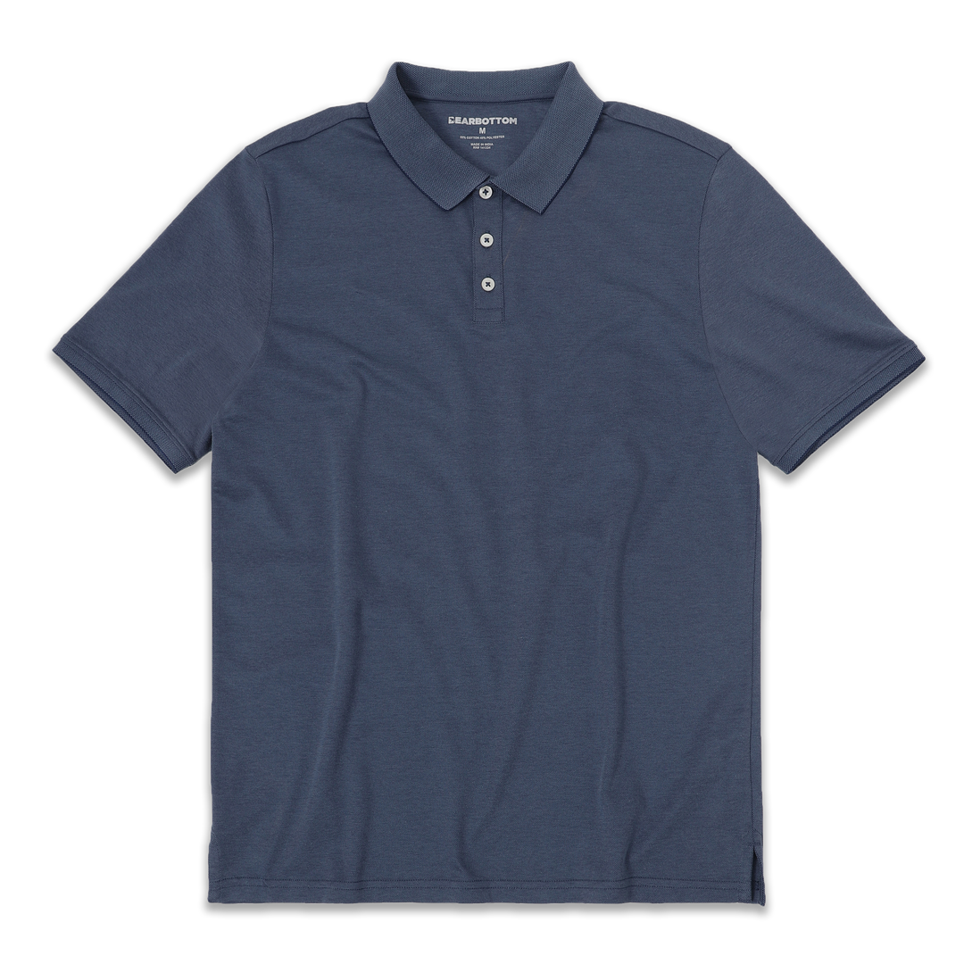 Range Polo Navy front with ribbed collar, ribbed short sleeves, and 3 white buttons