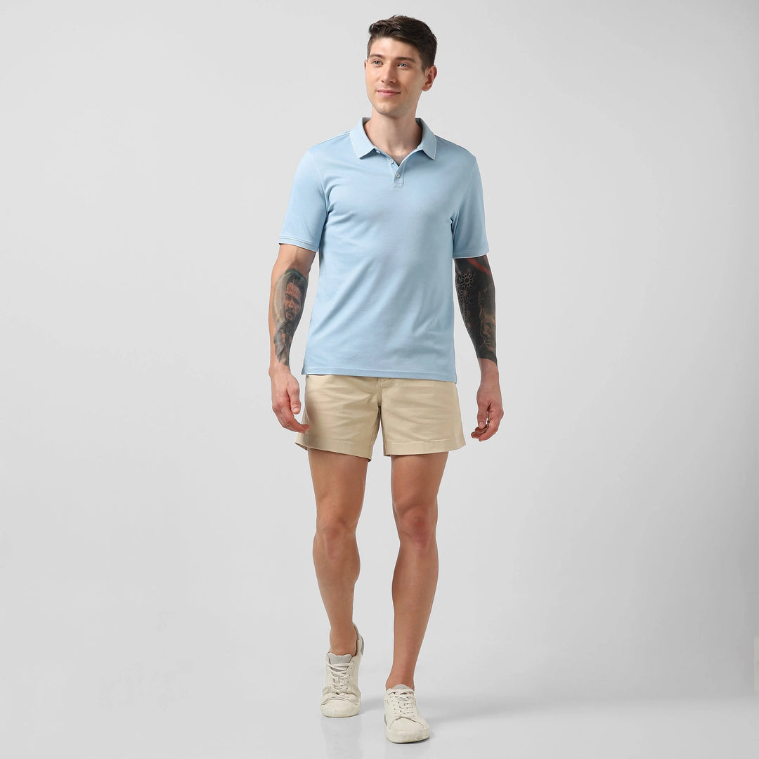 Range Polo Sky Blue full body on model wearing Stretch Short Sand Dune