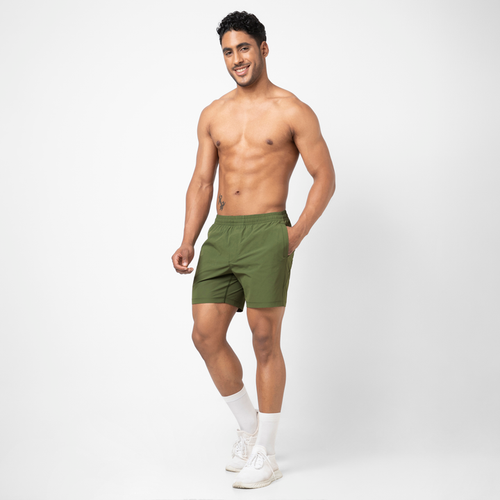 Atlas Short Military Green 5.5" on model with hand in pocket