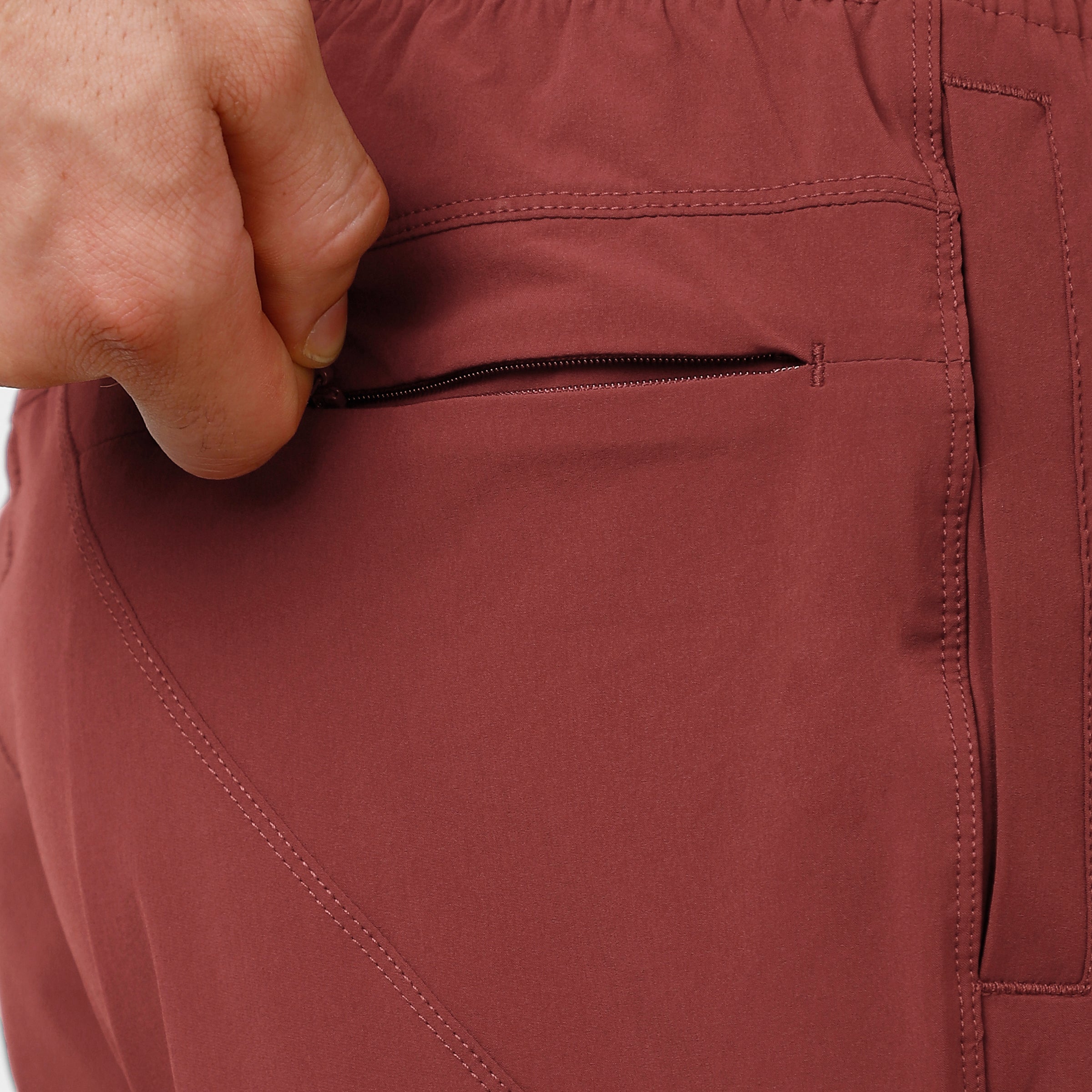 Atlas Short 7" Maroon close up of hidden zipper pocket
