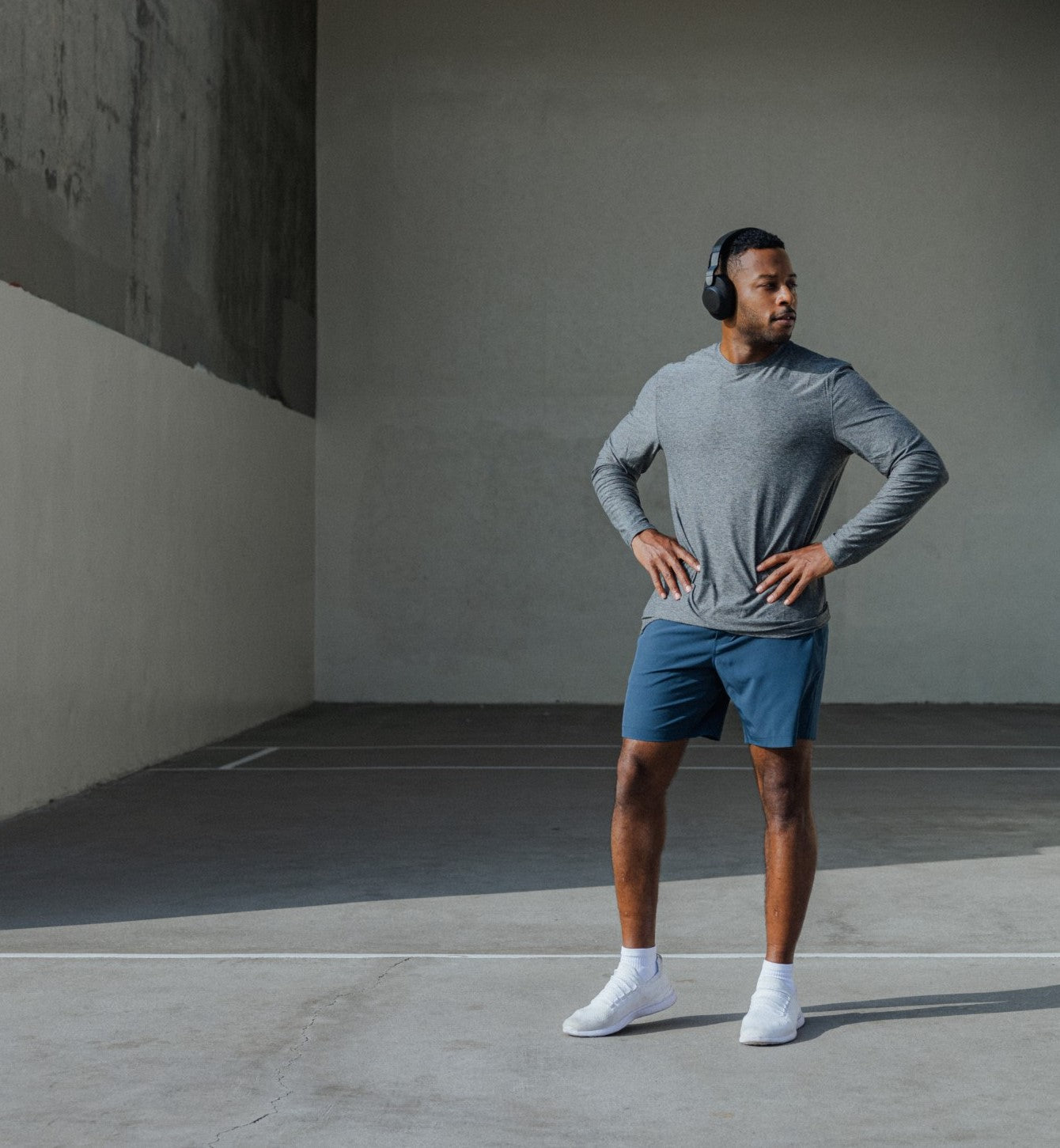 Model wearing Long Sleeve Tech Tee Grey