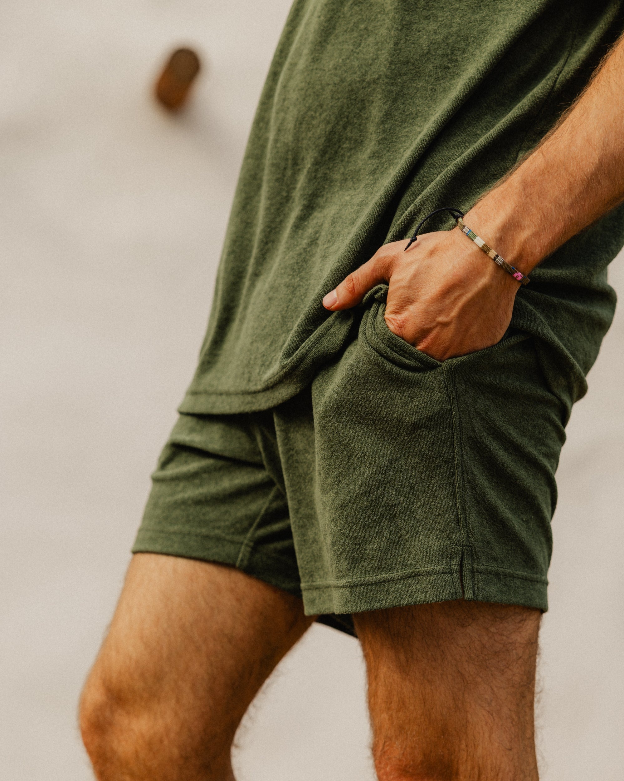 Person wearing Coastal Terry Polo and Coastal Terry Shorts in Olive
