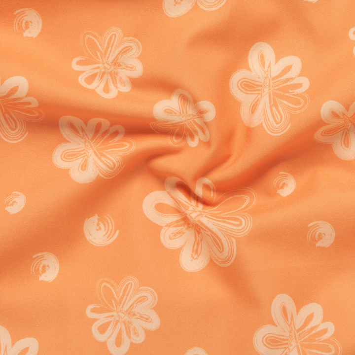 Boys Stretch Swim Bloom close up of floral orange print