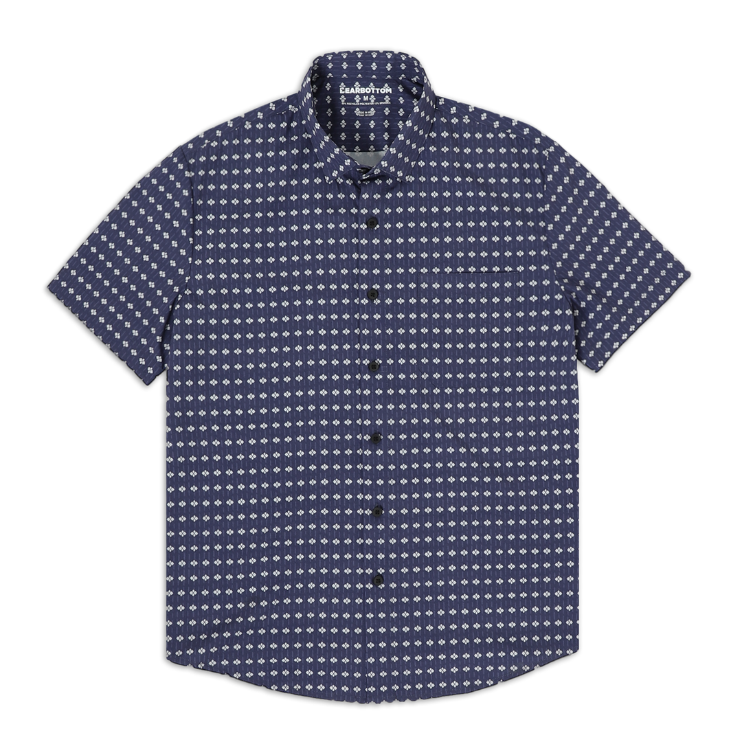 Cabana Shirt Mosaic, a navy blue with white geometric pattern, short sleeve button down collared shirt with a front left patch pocket