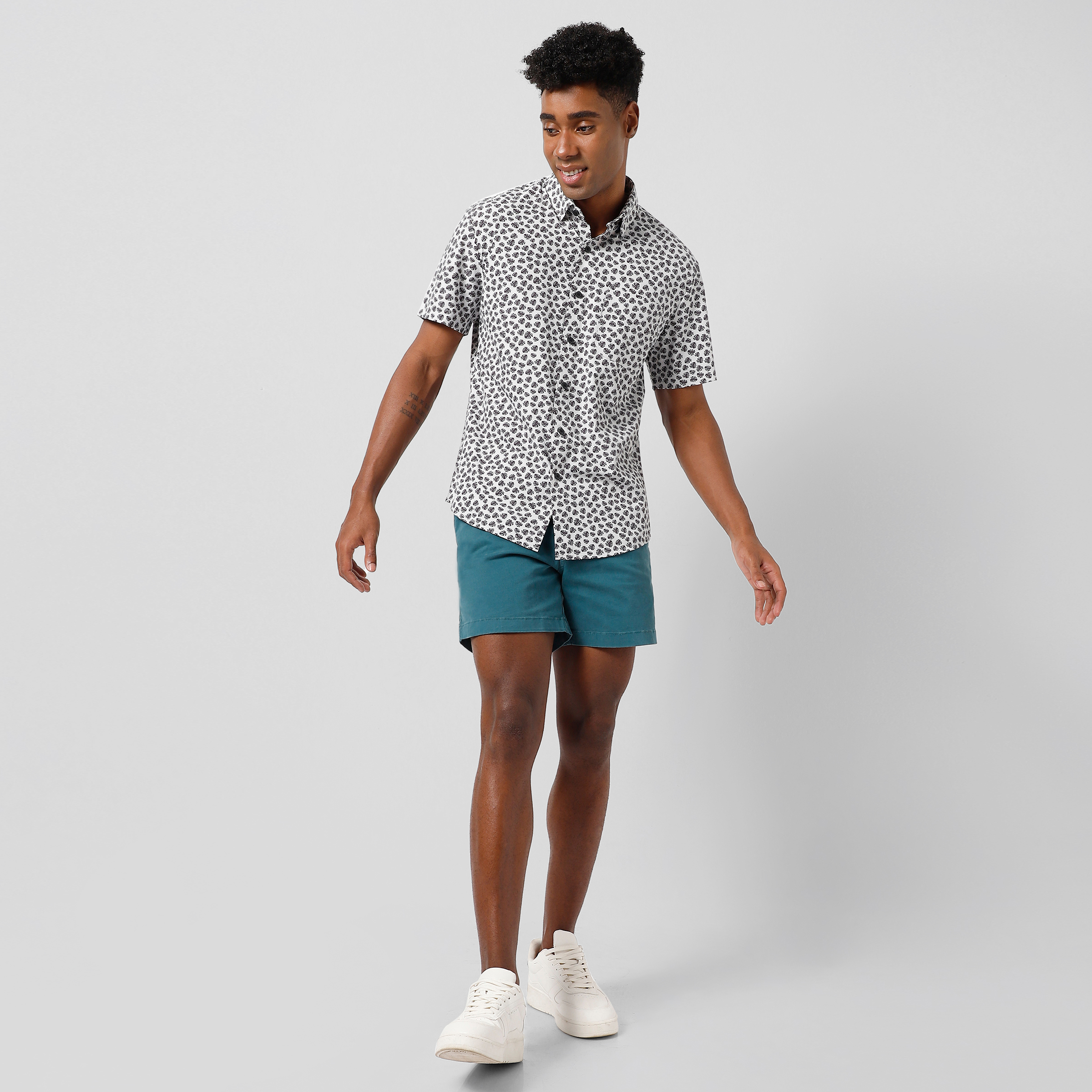 Cabana Shirt Monstera front on model worn with Stretch Short Dark Teal