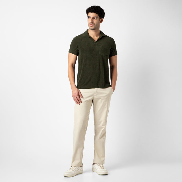 Coastal Terry Polo Dark Pine full body on model