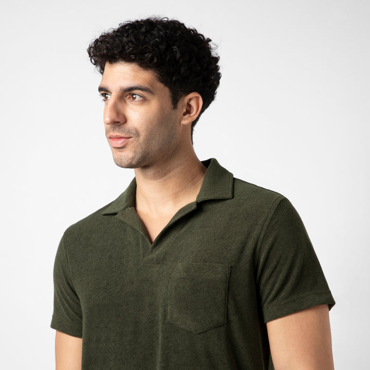 Coastal Terry Polo  Dark Pine close up on model