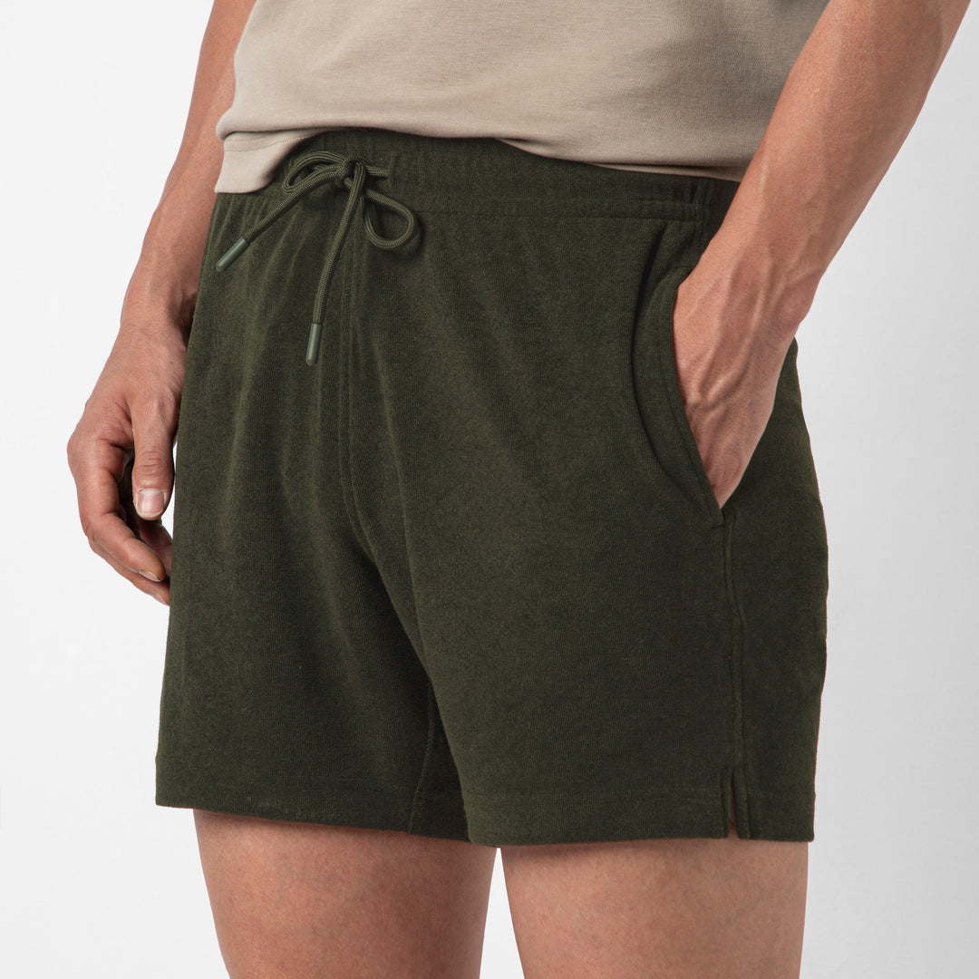 Coastal Terry Short Dark Pine close up on model