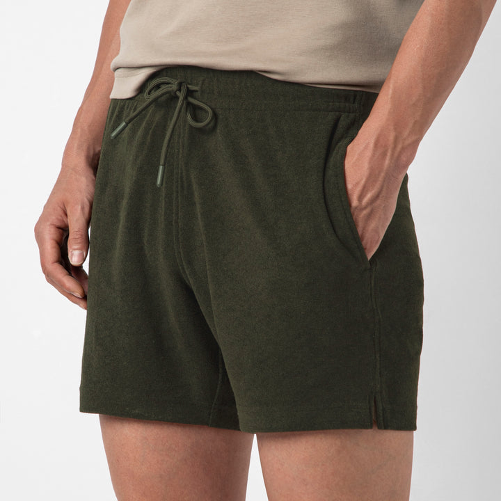 Coastal Terry Short Dark Pine close up on model