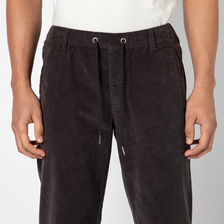 Corduroy Industry Pant Charcoal on model front close up