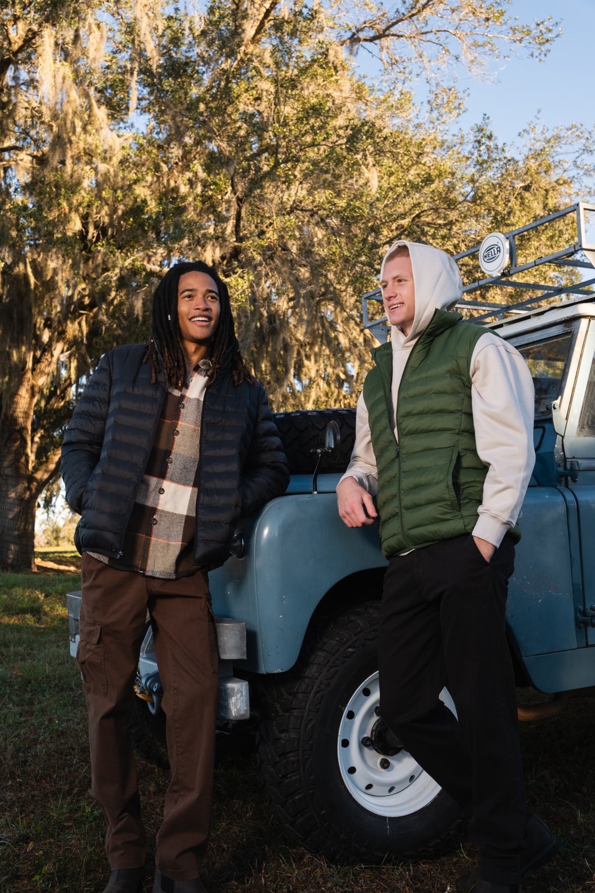 2 men in an outdoor setting wearing the Core Hoodie with the PrimaLoft Packable Vest and the PrimaLoft Packable Jacket.