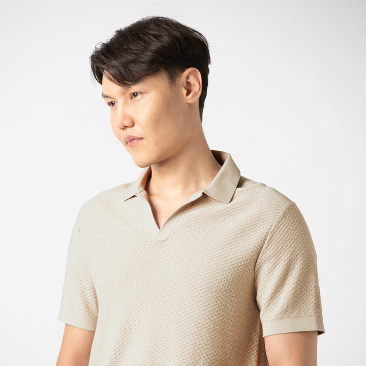 Diamond Knit Sweater Polo Bone close up on model