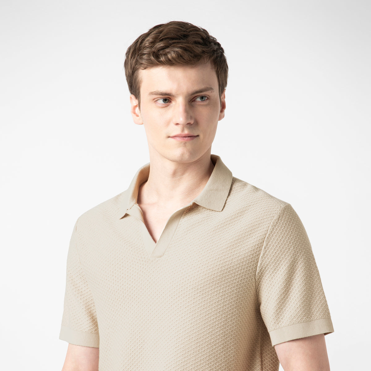 Diamond Knit Sweater Polo Bone close up on model