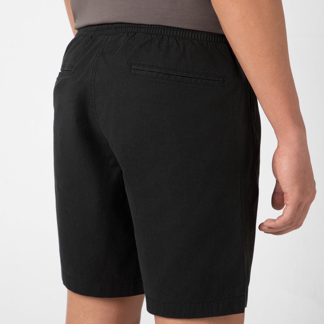 Drawstring Short 7" Black close up back pocket on model