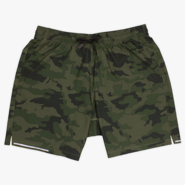 Run Short v2 7" Camo Green front with elastic waistband, dyed-to-match drawstring with rubberized tips, two front pockets, split hem, and reflective line on bottom right hem