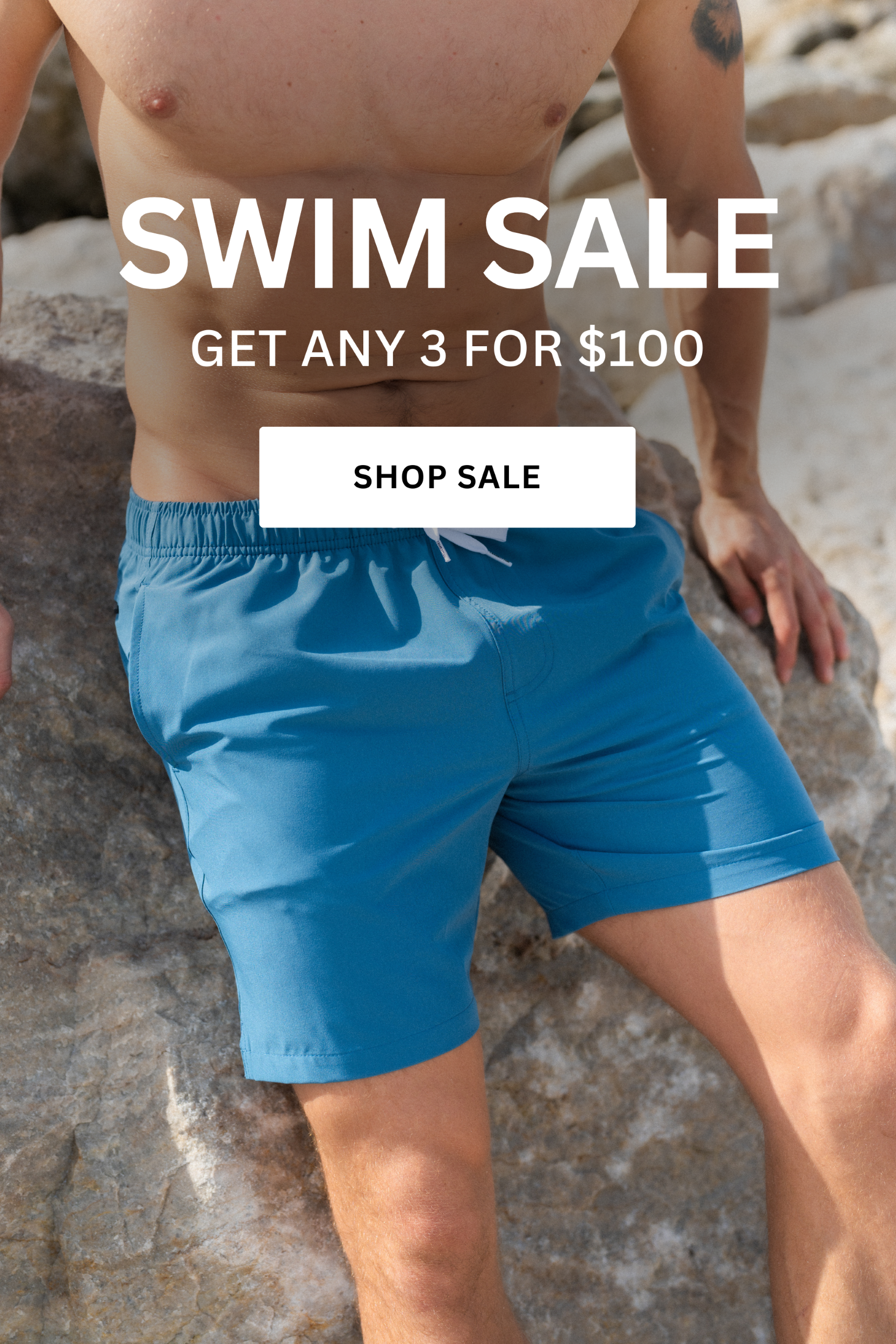 SWIM SALE - Get any 3 for $100. Model wearing Stretch Swim Solid Steel Blue. Shop sale now limited time offer. 