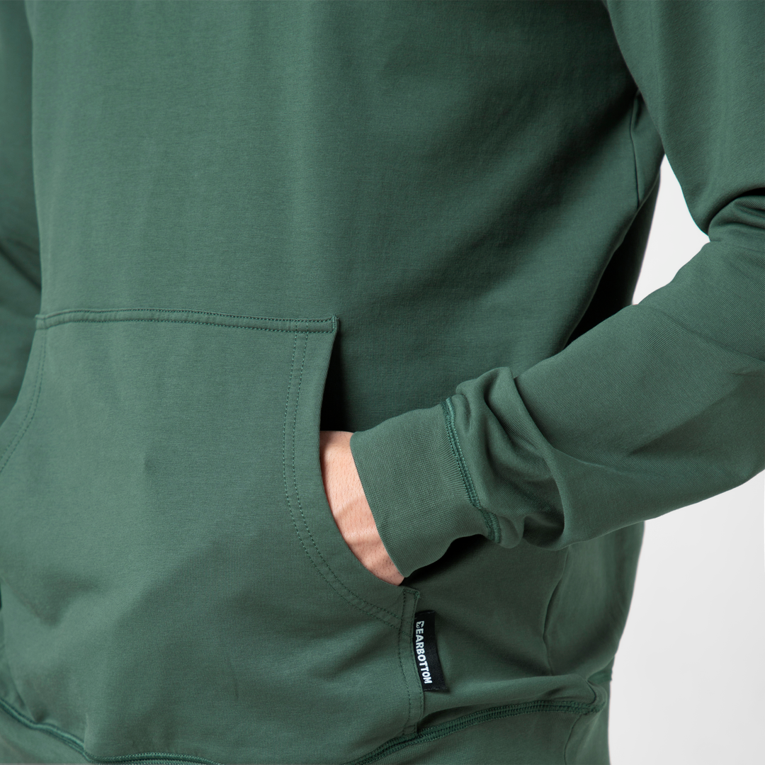 Lounge Hoodie Dark Sage close up front pocket on model