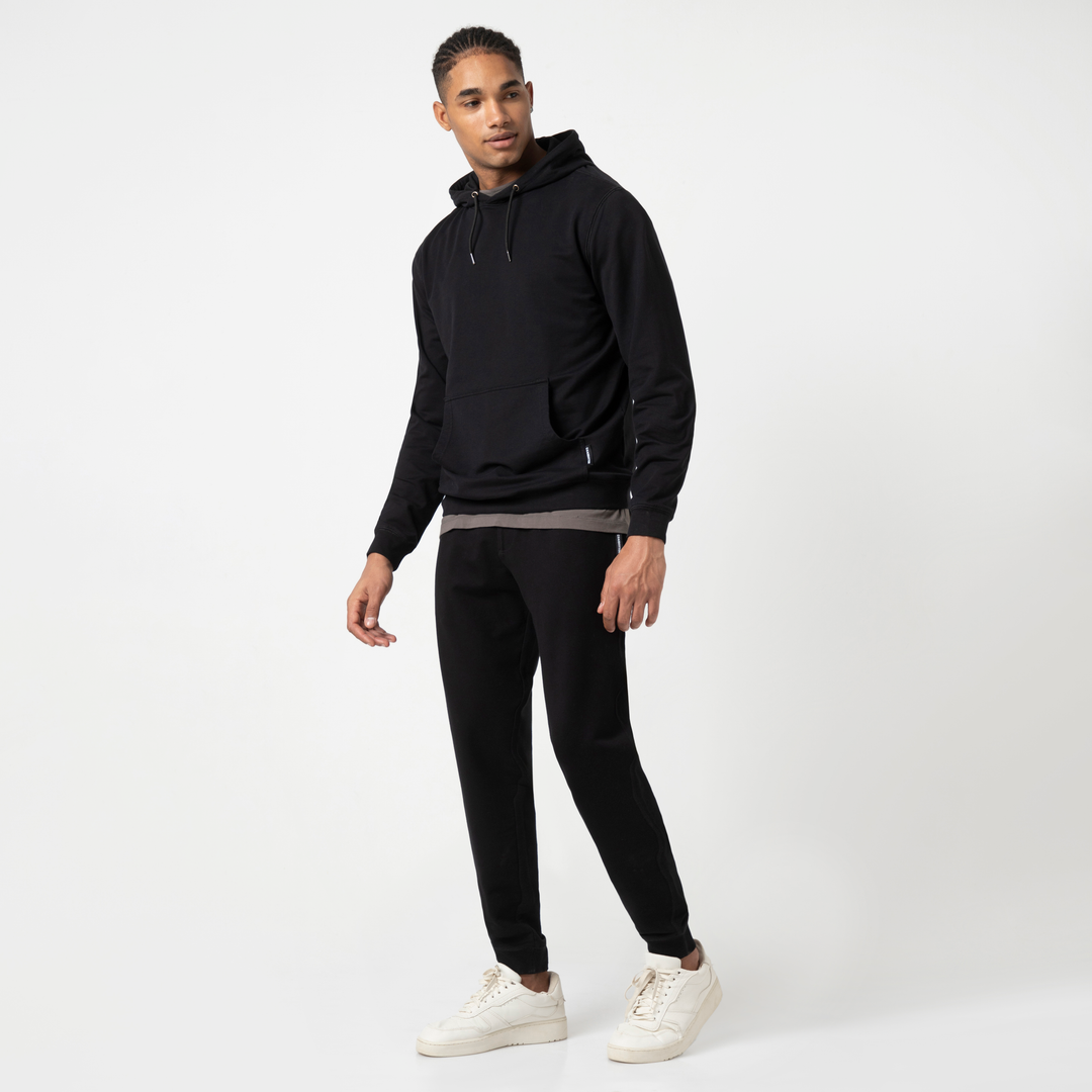 Lounge Jogger Black full body on model with Lounge Hoodie Black