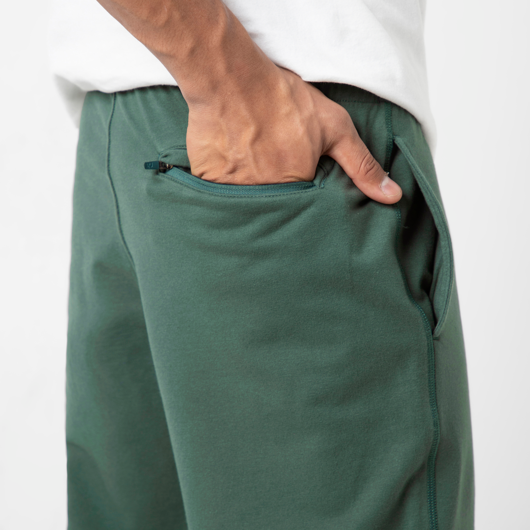 Lounge Jogger Dark Sage close up back zipper pocket on model