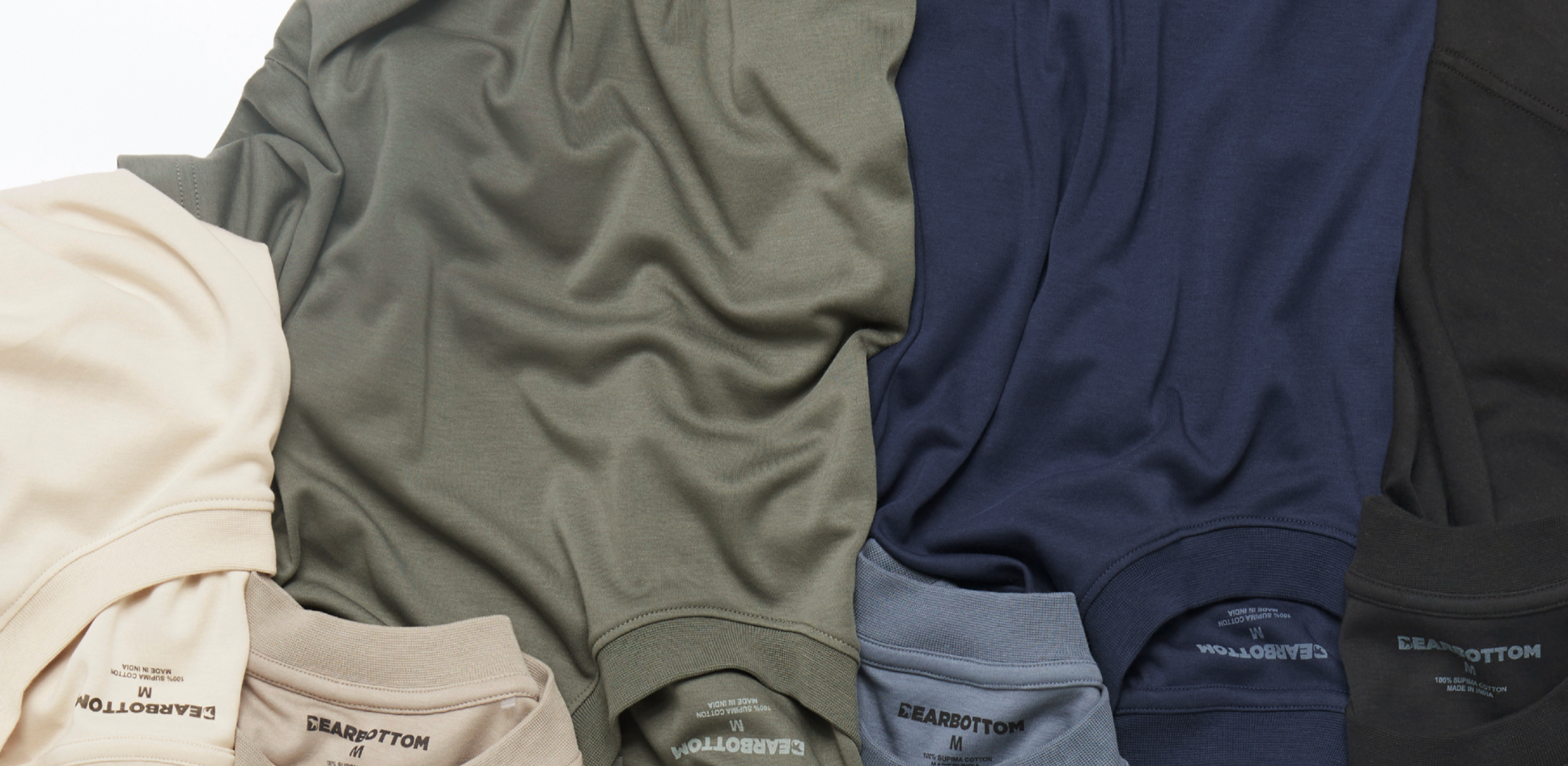 Midweight Supima Tee flat stack in bone, fossil, graphite, denim, navy and black