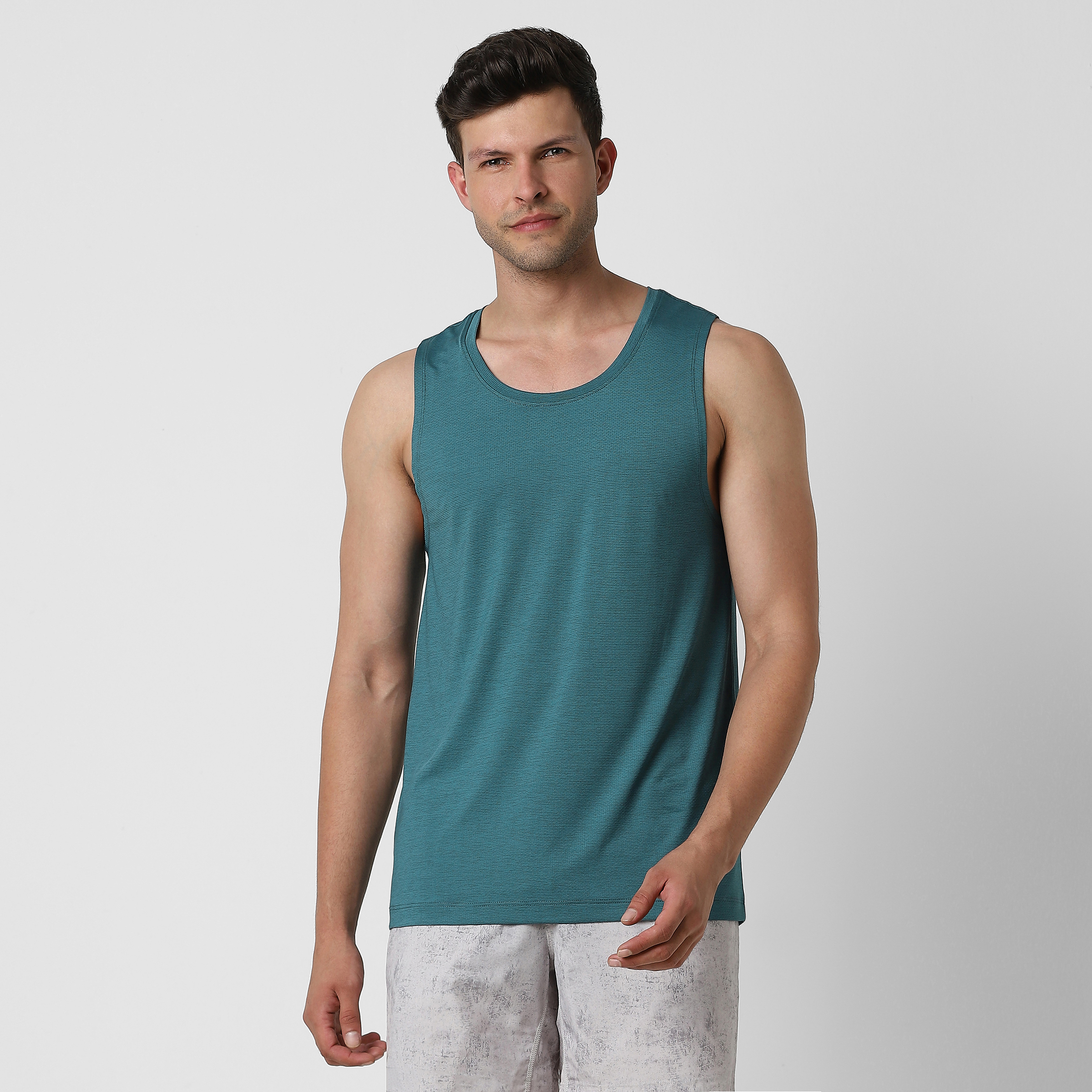 Pace Tank Dark Teal front on model