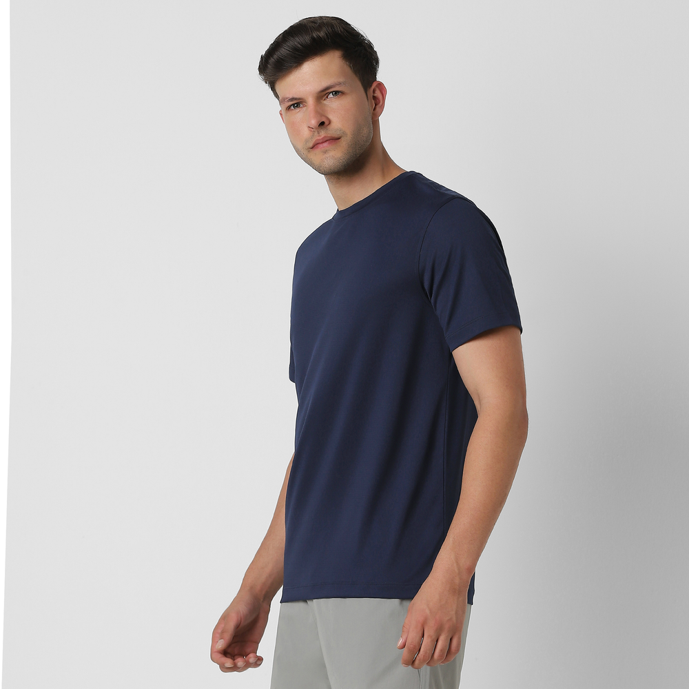 Power Tee Navy side on model