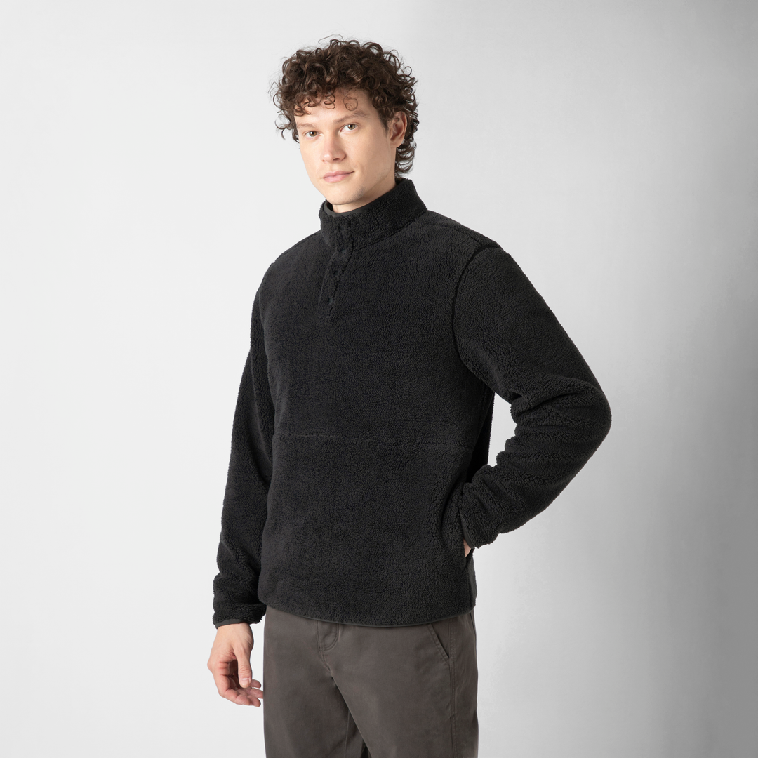 Quarter Snap Sherpa Pullover Black side on model