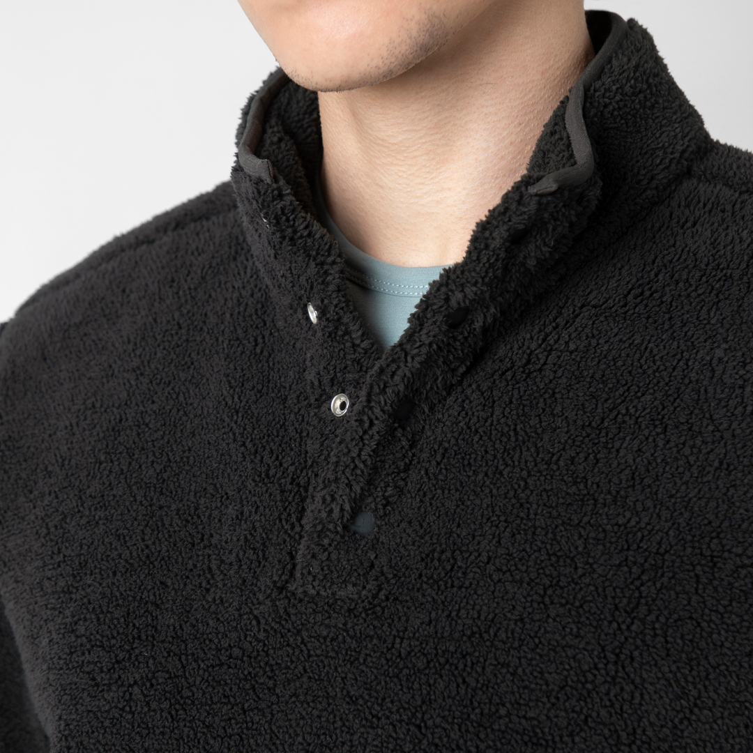 Quarter Snap Sherpa Pullover Black collar close up on model