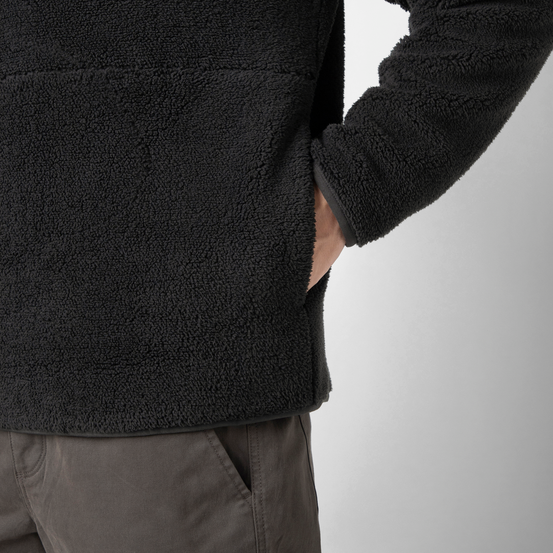 Quarter Snap Sherpa Pullover Black pocket close up on model