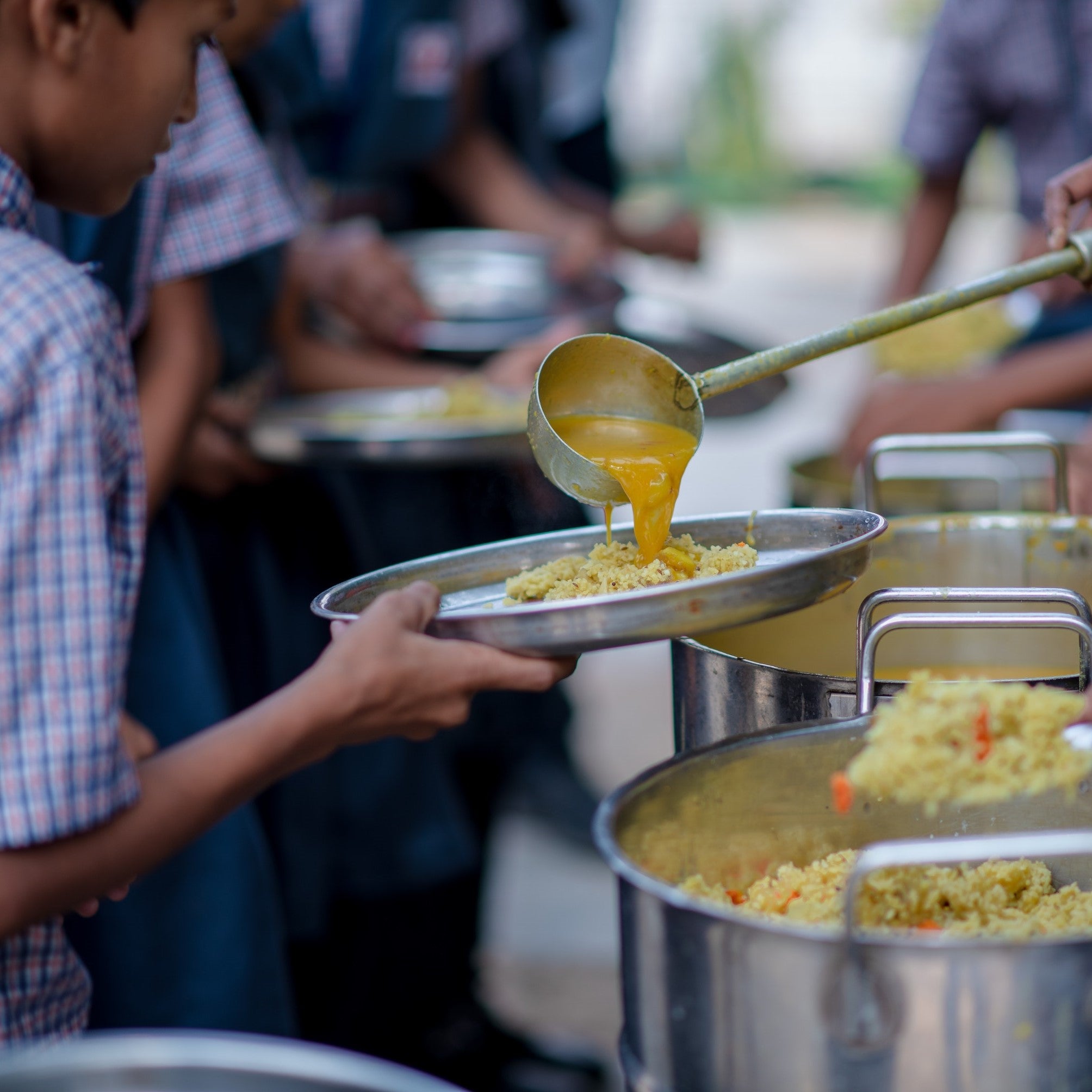Meals being donated at the Rankapur School in India