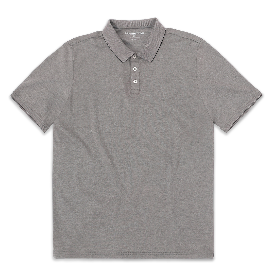 Range Polo Charcoal front with ribbed collar, ribbed short sleeves, and 3 white buttons