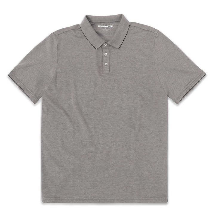 Range Polo Charcoal front with ribbed collar, ribbed short sleeves, and 3 white buttons