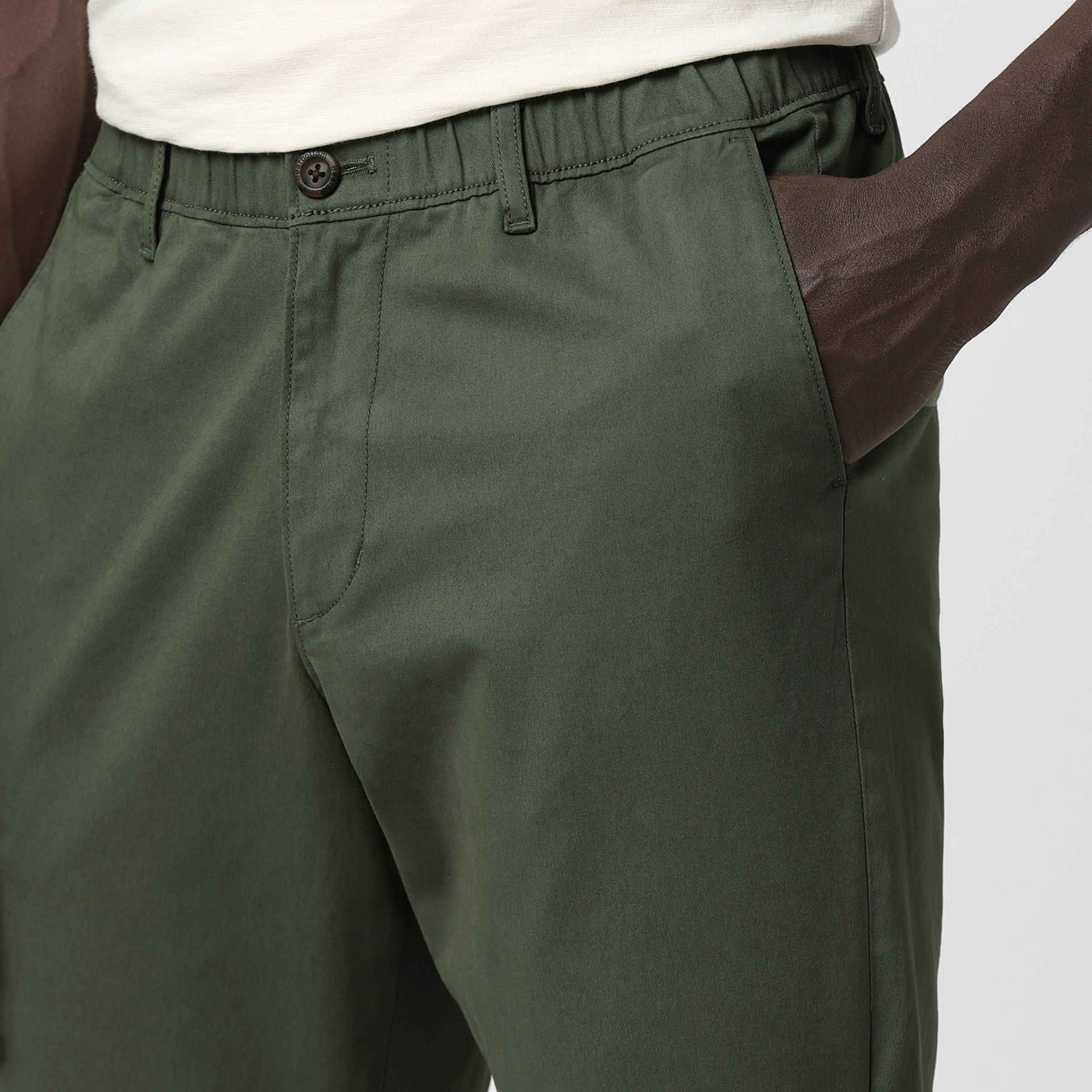 Relaxed Stretch Chino Pant Fern close up front left pocket on model