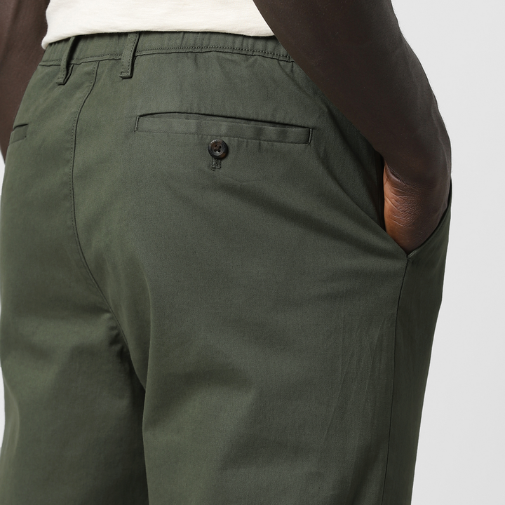 Relaxed Stretch Chino Pant Fern close up back right pocket on model
