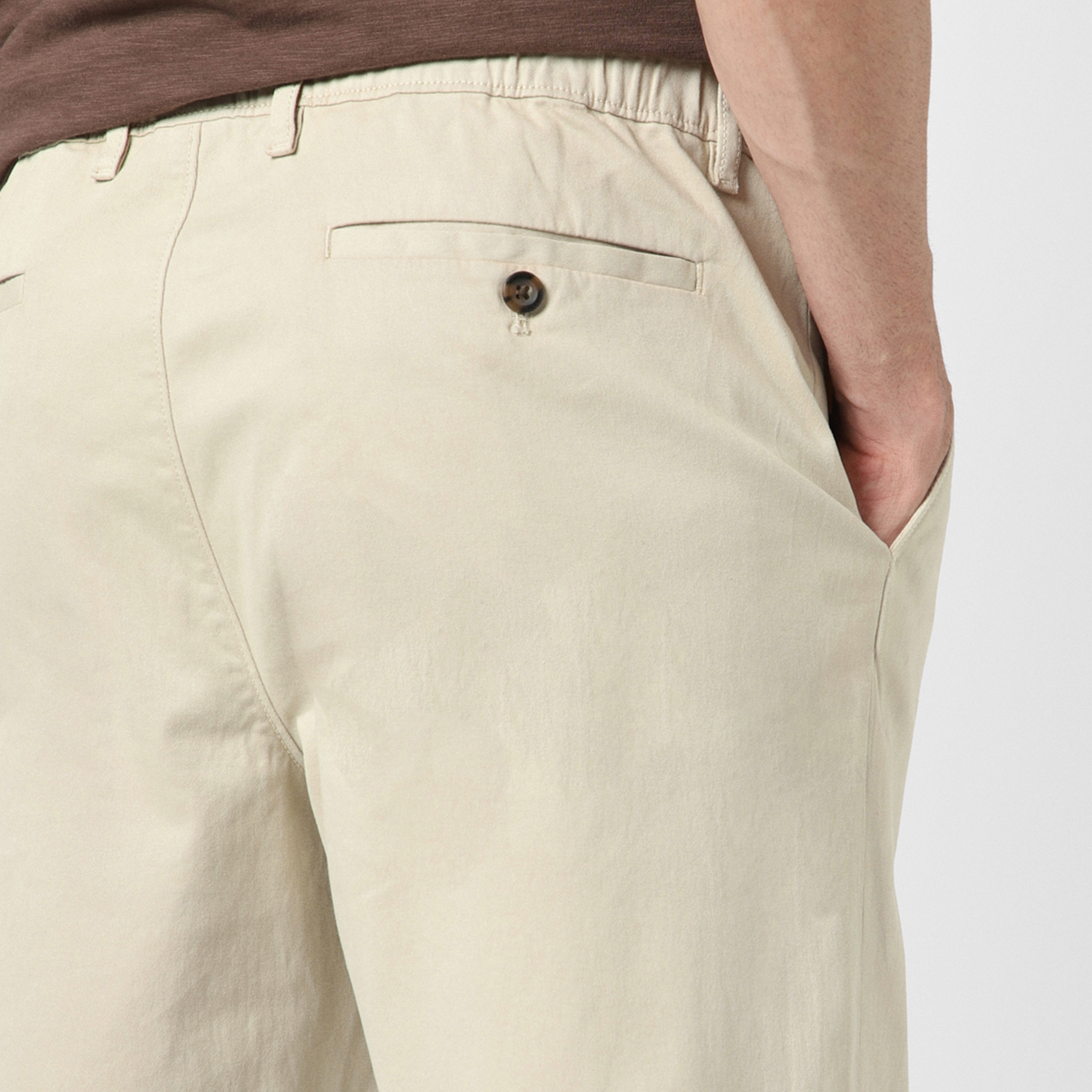 Relaxed Stretch Chino Pant Stone close up back right pocket on model