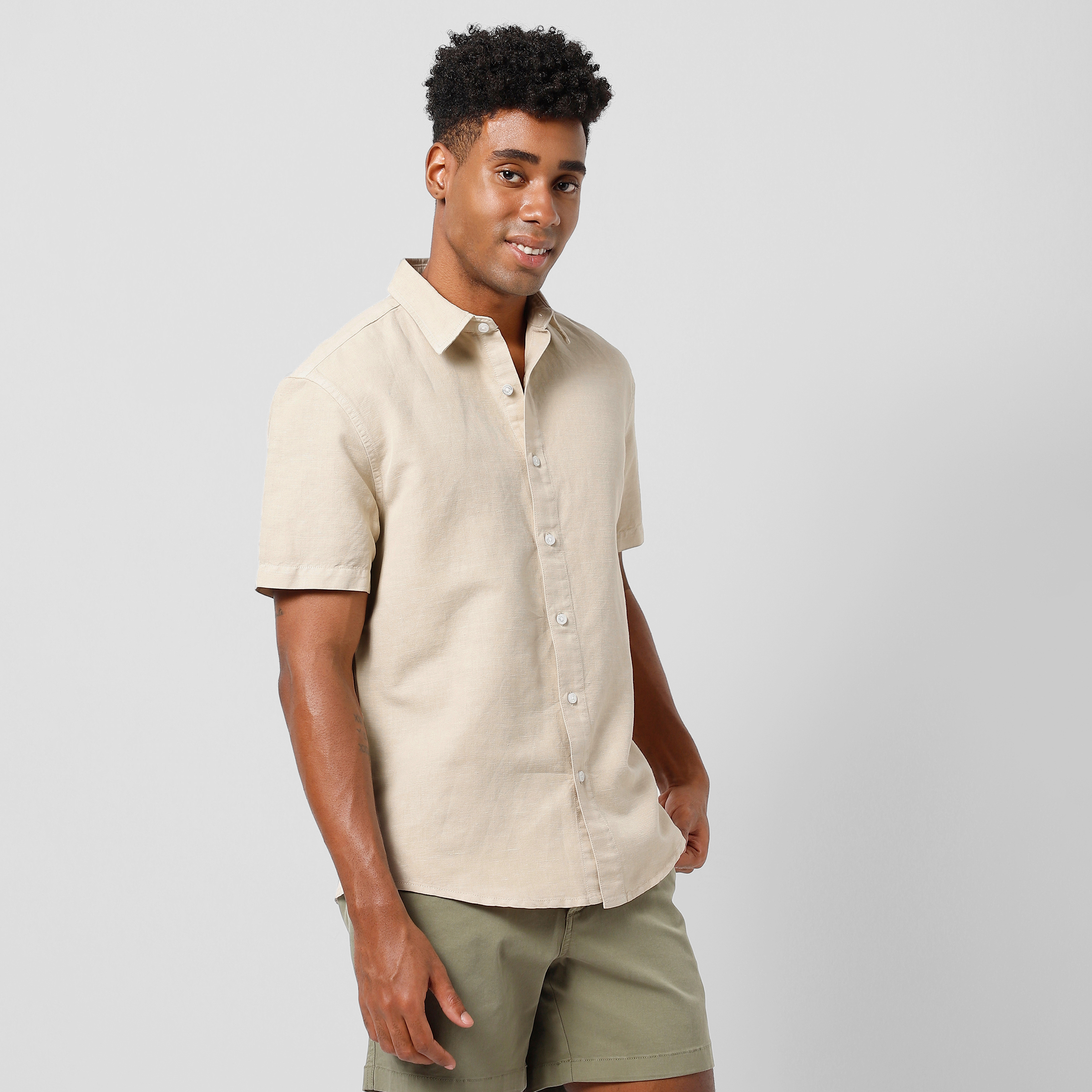 Retreat Linen Shirt Beige side on model