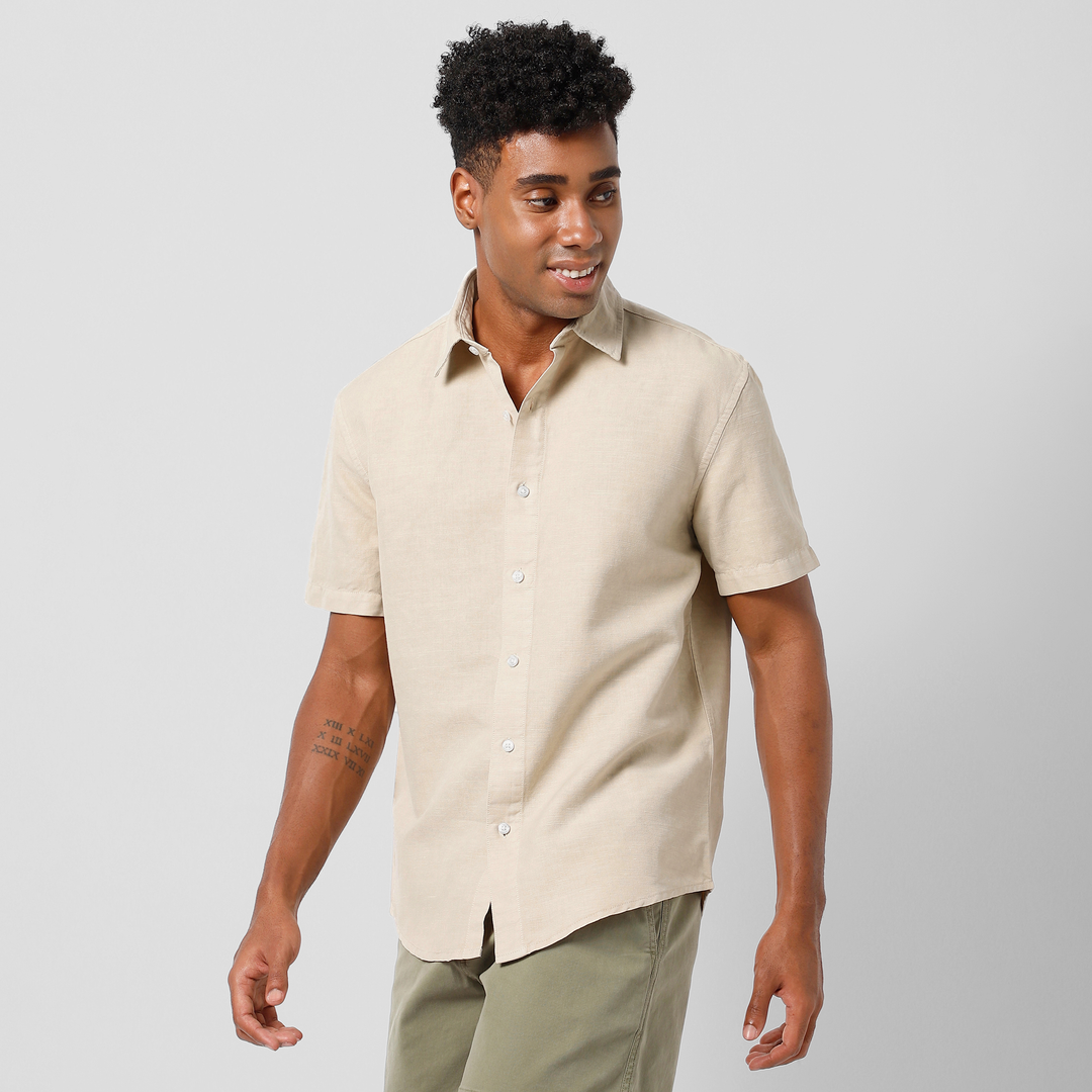 Retreat Linen Shirt Beige front on model walking