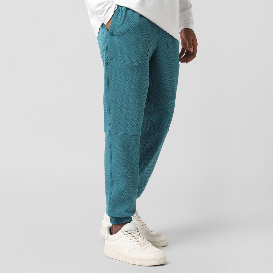 Roam Jogger Dark Teal right side on model