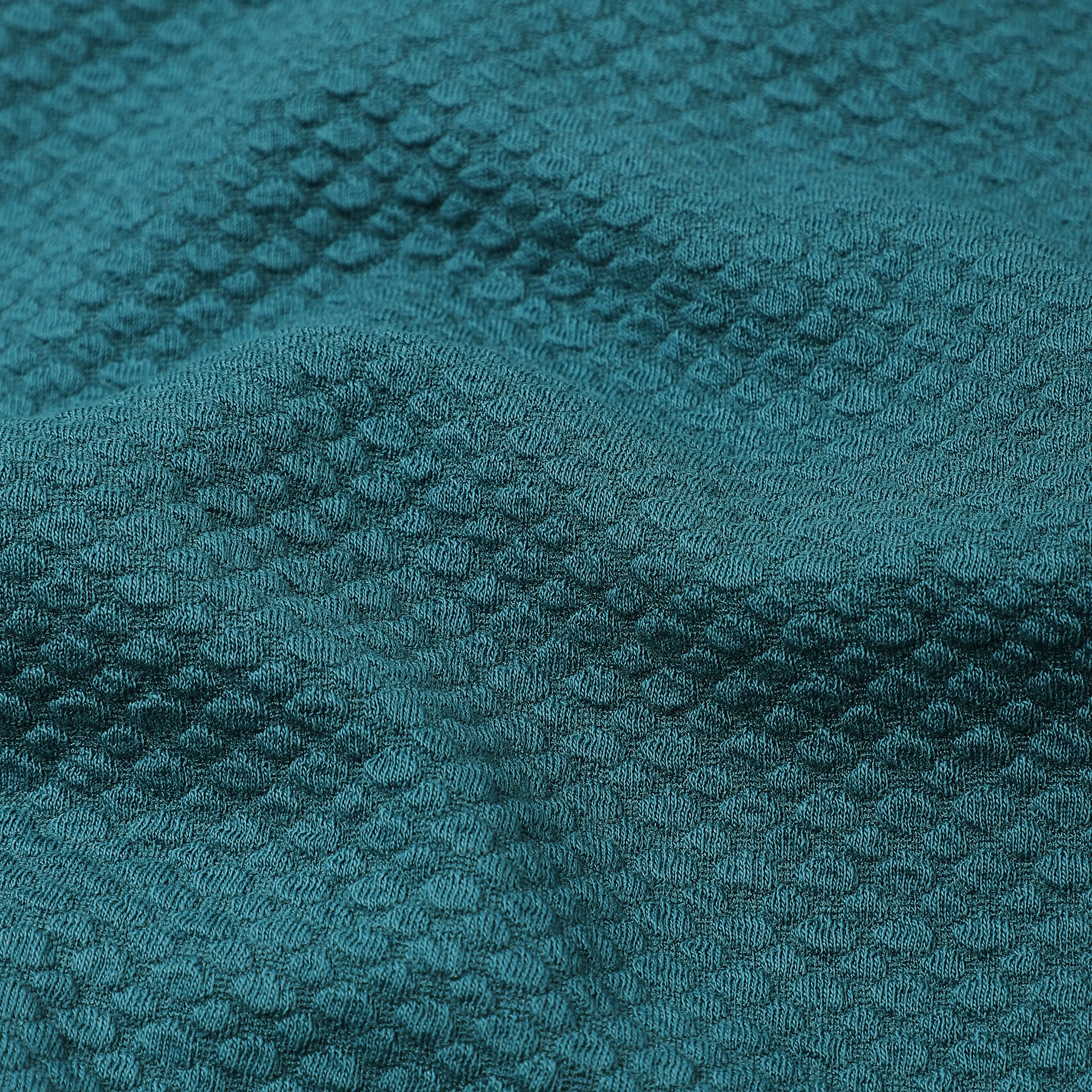 Roam Hoodie Dark Teal close up of fabric