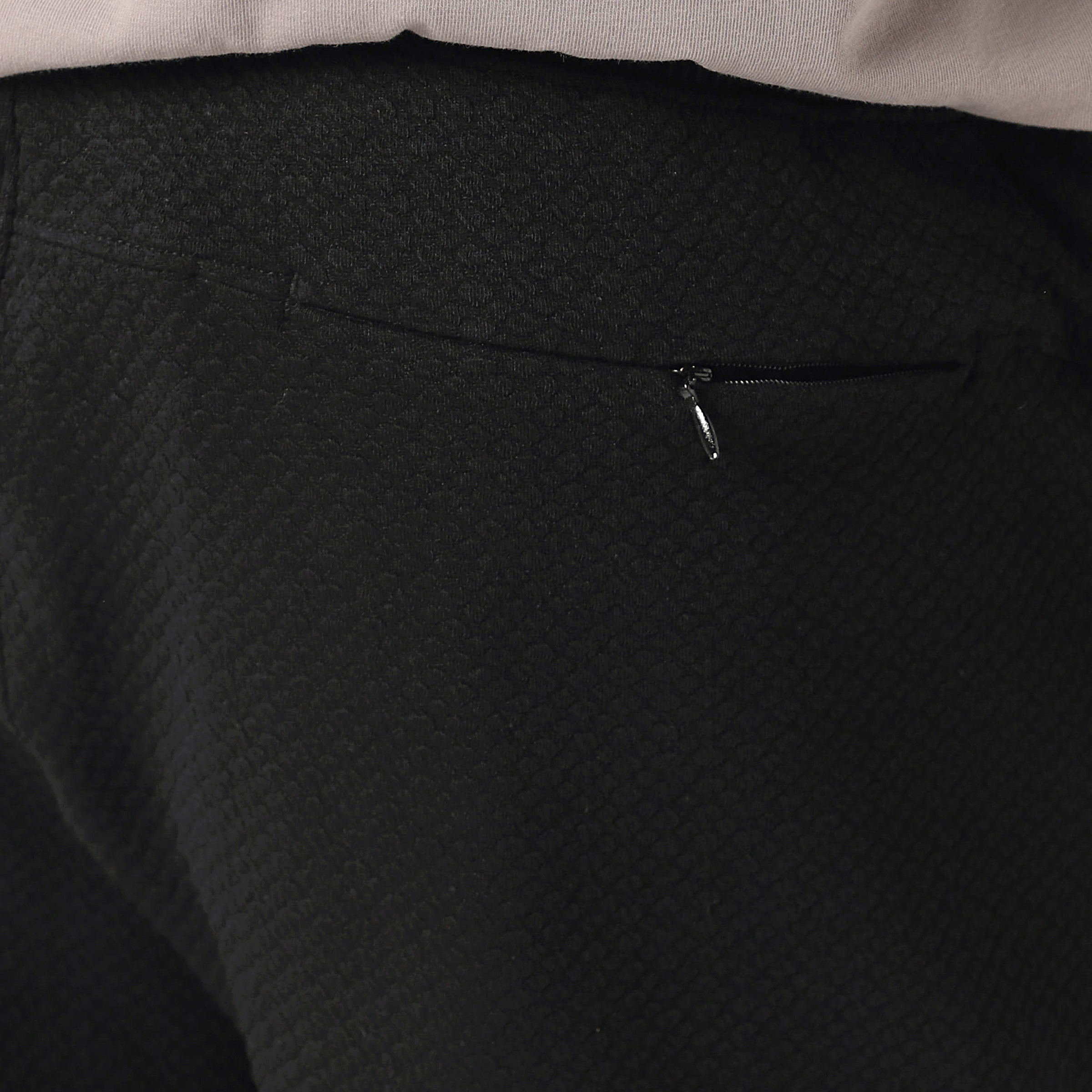 Roam Jogger Black close up of back zipper pocket