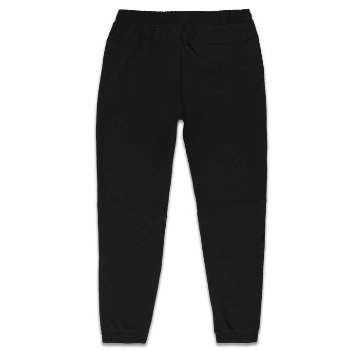 Roam Jogger Black back with an elastic waistband, back right zipper pocket, and ribbed ankle cuffs