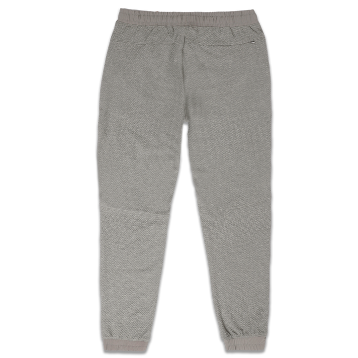 Roam Jogger Heather Grey back with an elastic waistband, back right zipper pocket, and ribbed ankle cuffs