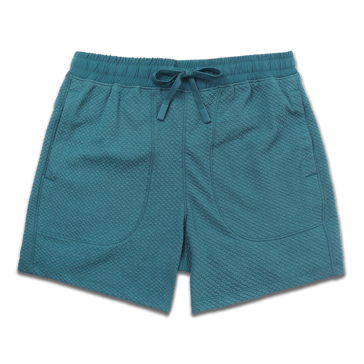 Roam Short 5.5" Dark Teal front with an elastic waistband, two side seam pockets, and dyed to match drawstring