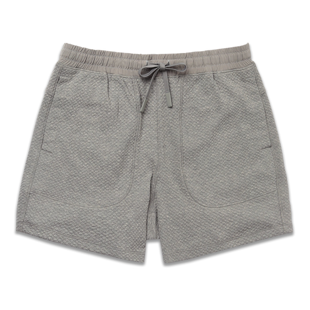 Roam Short 5.5" Heather Grey front with an elastic waistband, two side seam pockets, and dyed to match drawstring