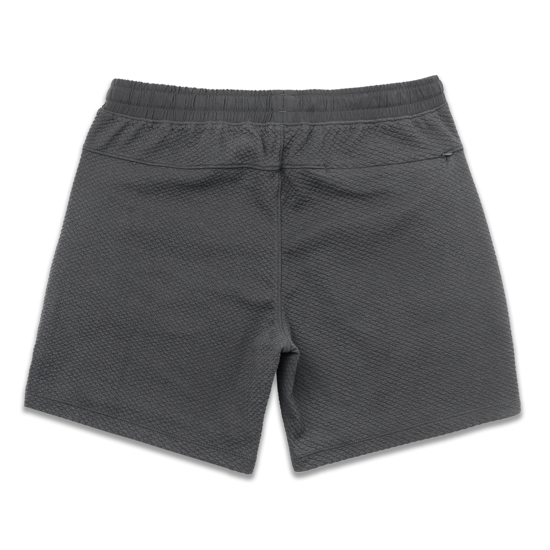 Roam Short 7" Coal back with elastic waistband and back right hidden zipper pocket