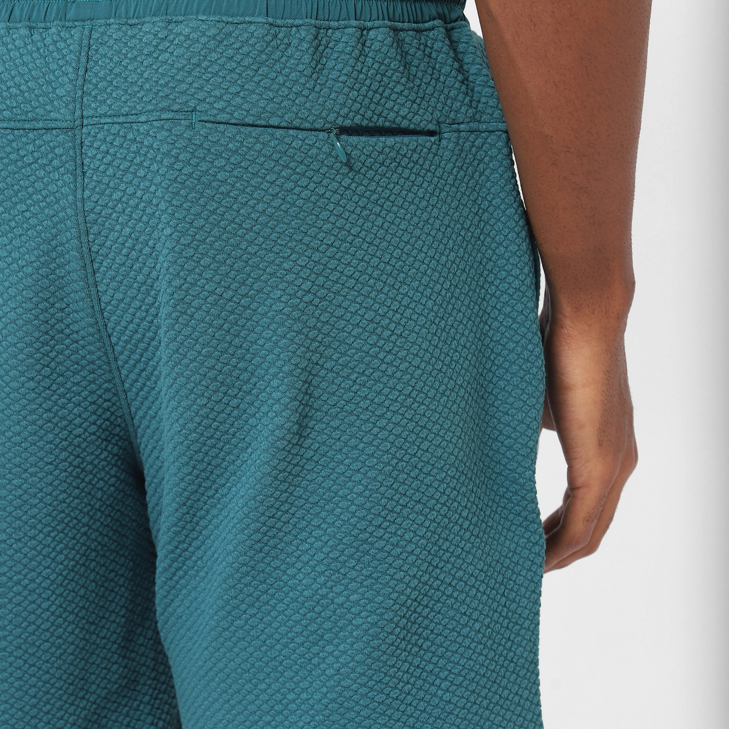 Roam Short 7" Dark Teak close up of back zipper pocket