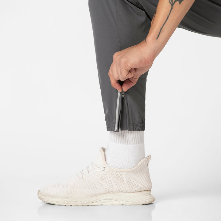 Run Jogger Coal bottom hem zipper with reflective tape