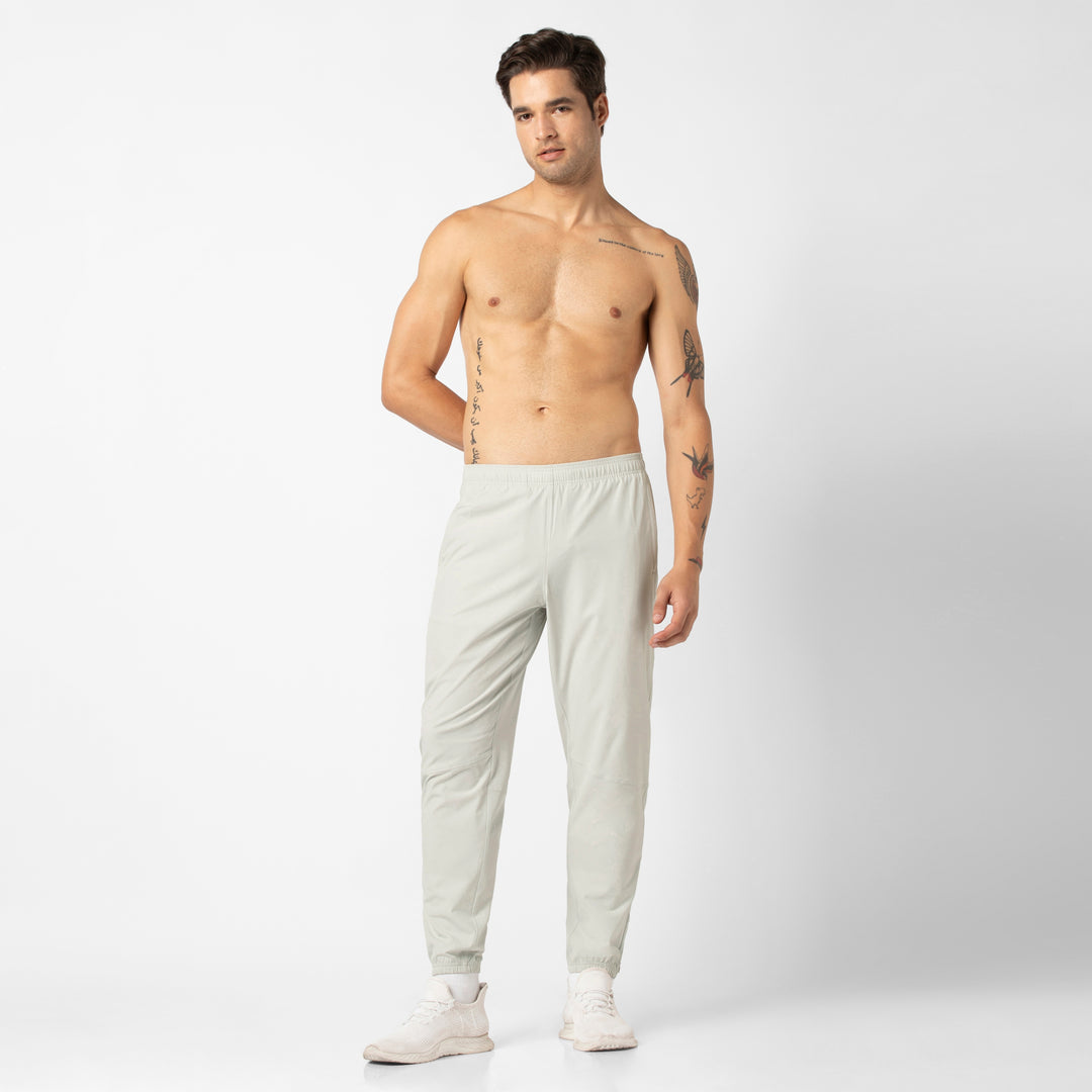 Run Jogger Light Grey full body on model with no shirt