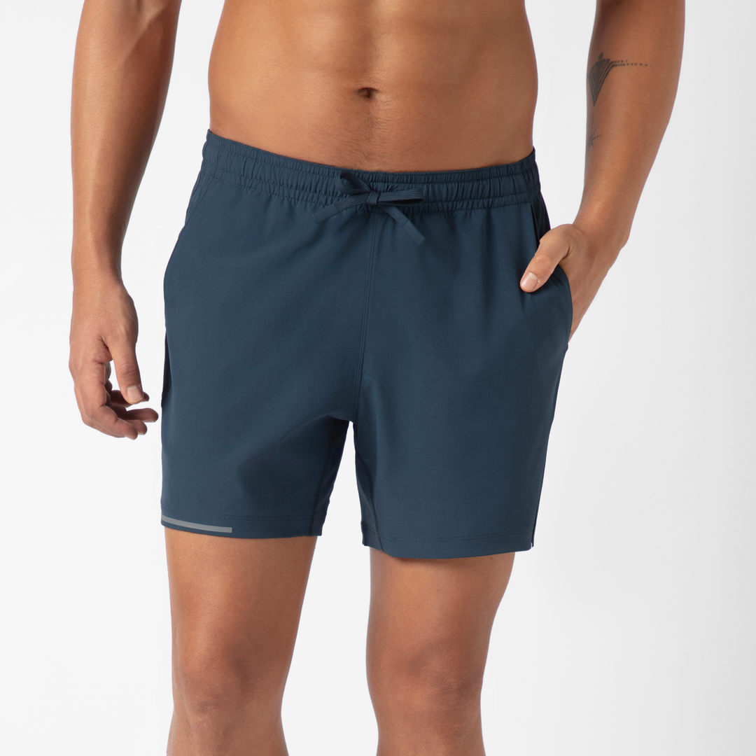 Run Short v2 5.5" in Navy front on model