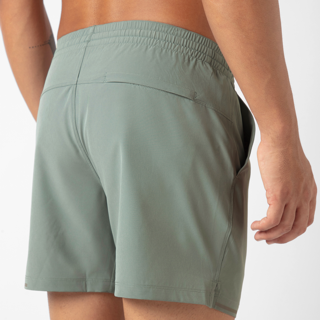 Run Short v2 5.5" in Shark Grey back close up of zipper pocket on model 